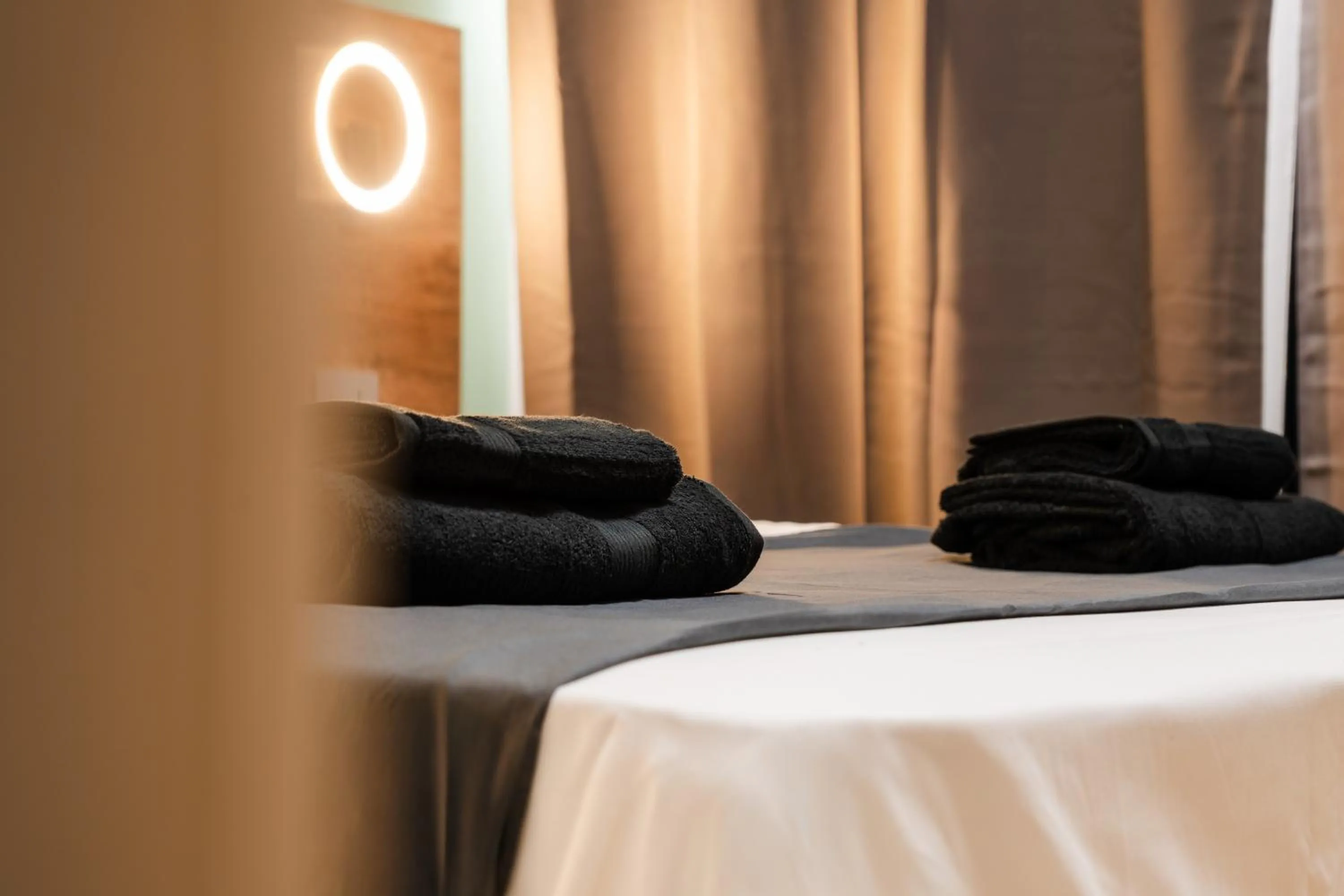 Bed in Elysium Self Check-In Rooms