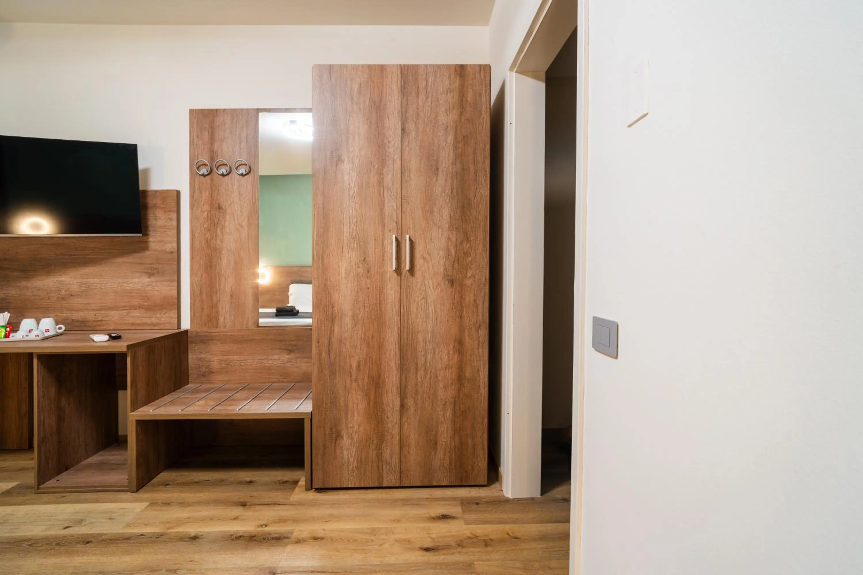 Bed in Elysium Self Check-In Rooms