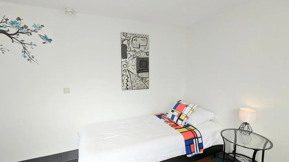 Bed in The Amsterdam Hotel Apartment in the Center