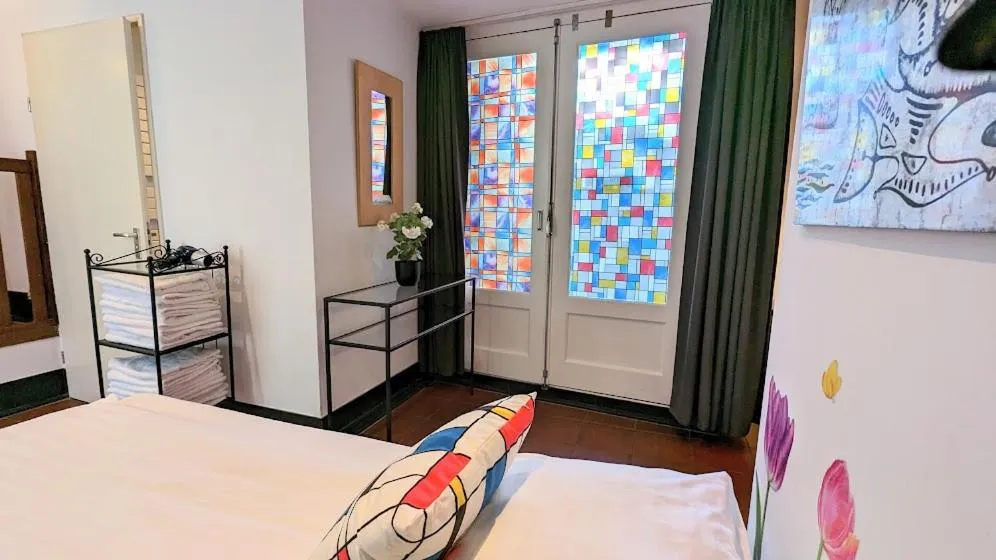 Bed in The Amsterdam Hotel Apartment in the Center