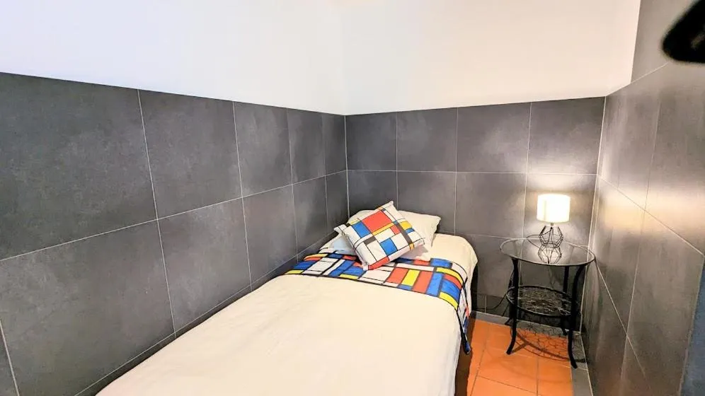 Bed in The Amsterdam Hotel Apartment in the Center