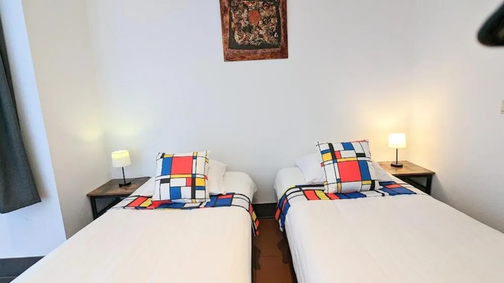 Bed in The Amsterdam Hotel Apartment in the Center