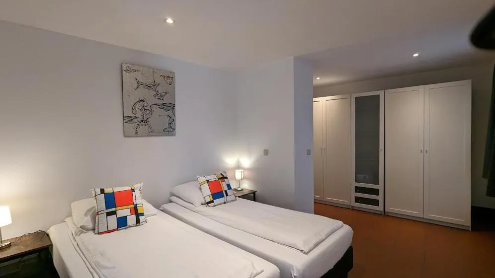 Bed in The Amsterdam Hotel Apartment in the Center