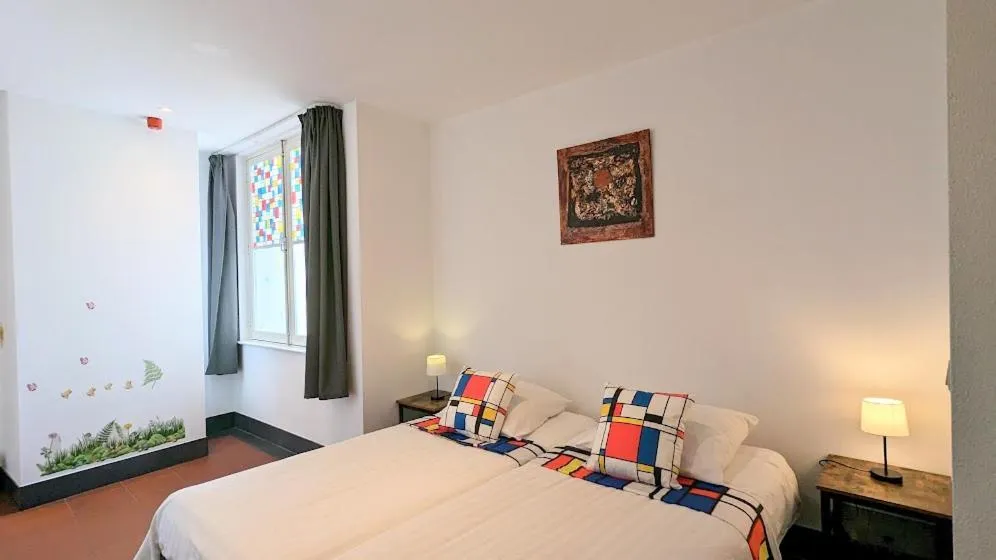 Bed in The Amsterdam Hotel Apartment in the Center