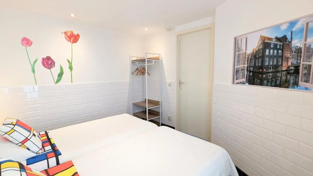 Bed in The Amsterdam Hotel Apartment in the Center