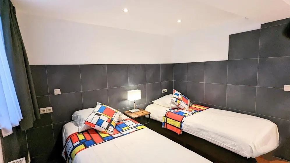 Bed in The Amsterdam Hotel Apartment in the Center