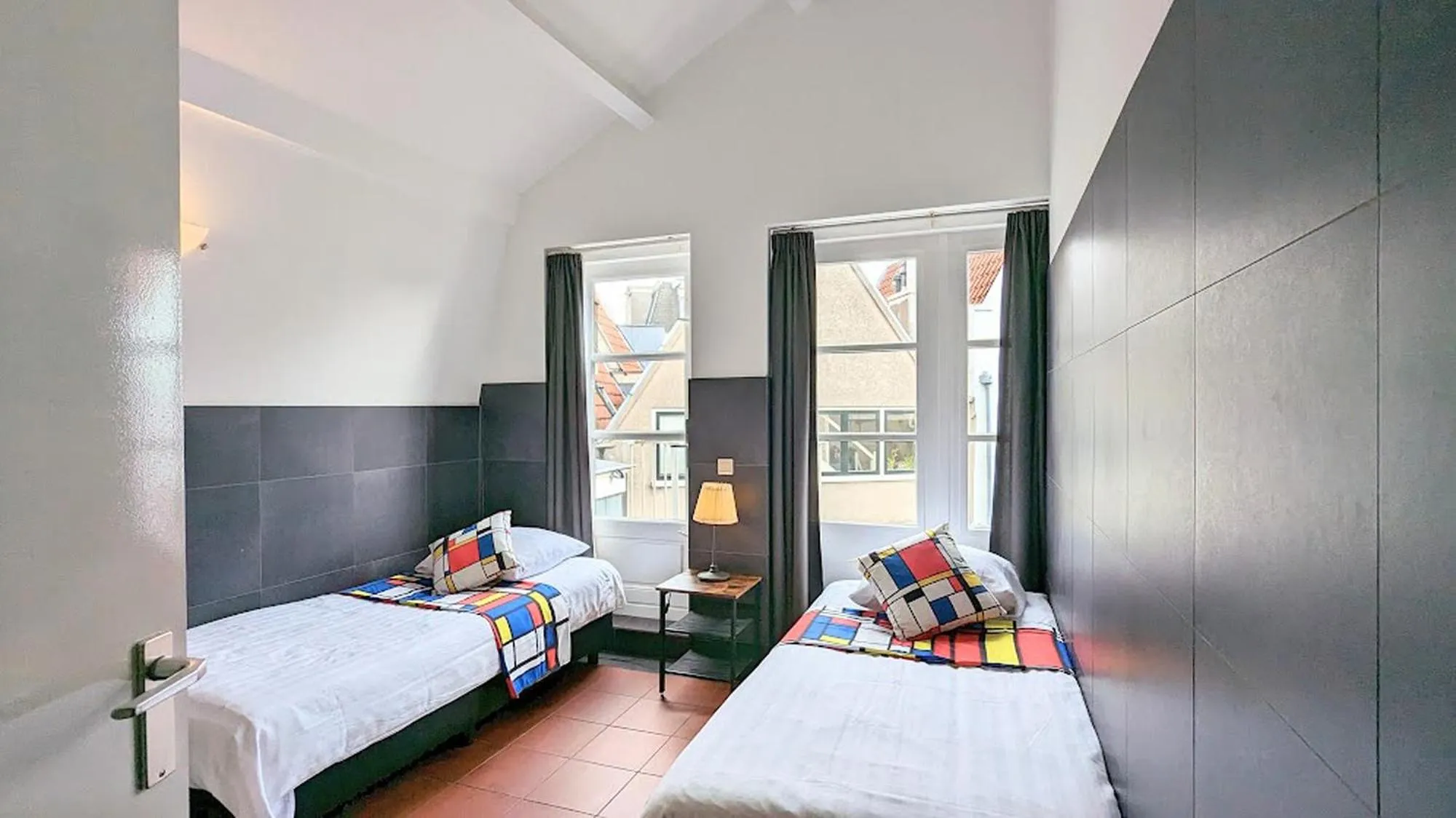 Bed in The Amsterdam Hotel Apartment in the Center