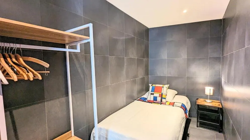 Bed in The Amsterdam Hotel Apartment in the Center