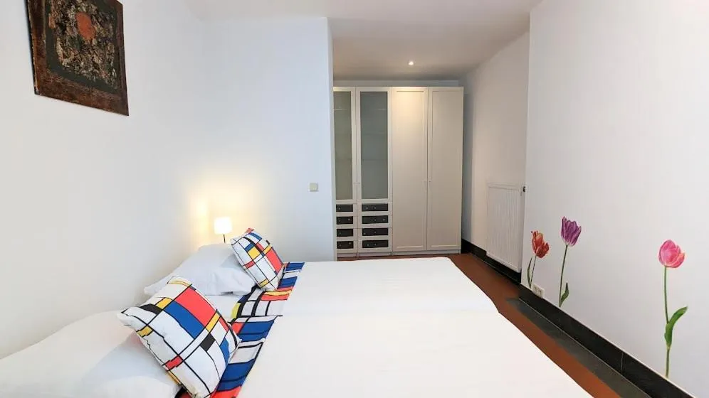 Bed in The Amsterdam Hotel Apartment in the Center