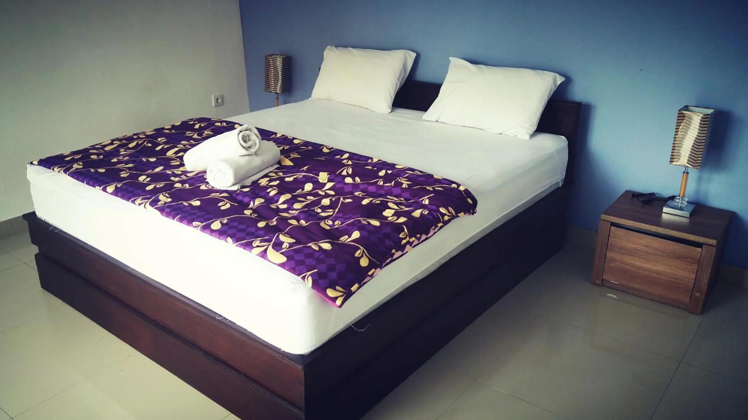 Bed in Bunutbali Villas88