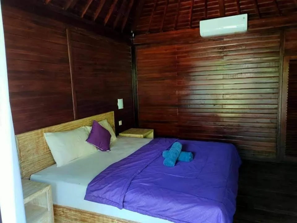 Bed in Bunutbali Villas88