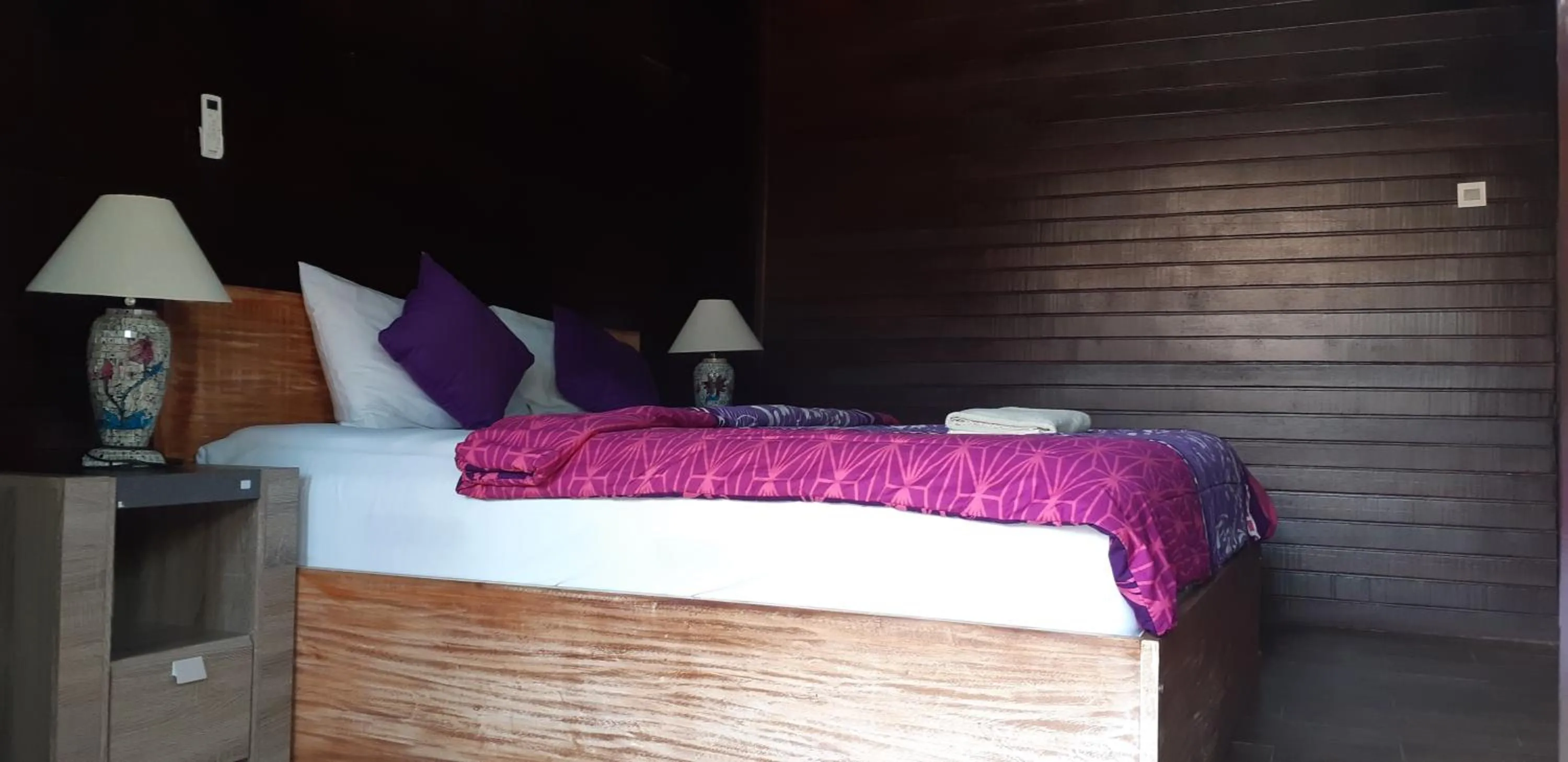 Bed in Bunutbali Villas88
