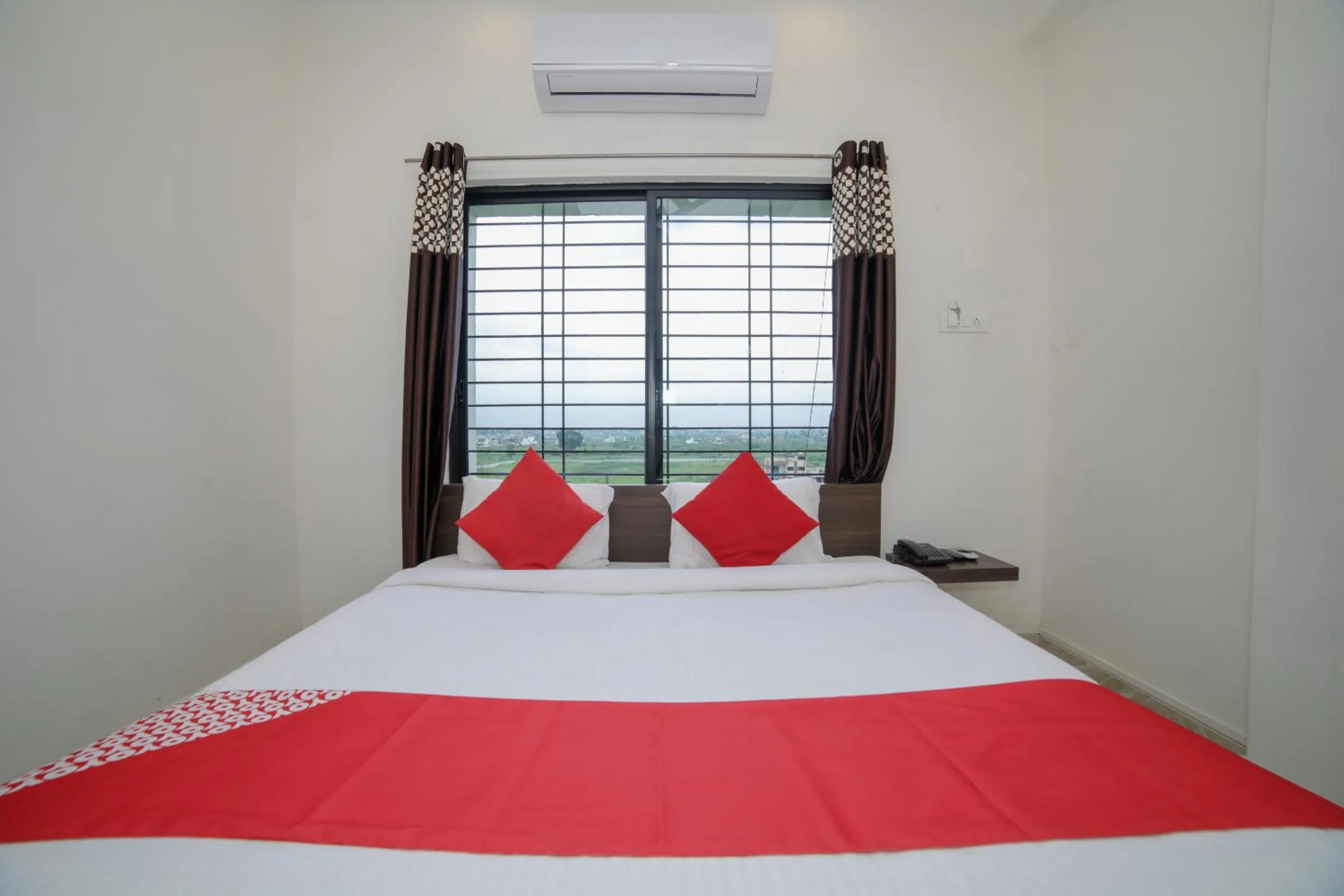Bed in Hotel O Seva Service Apartment