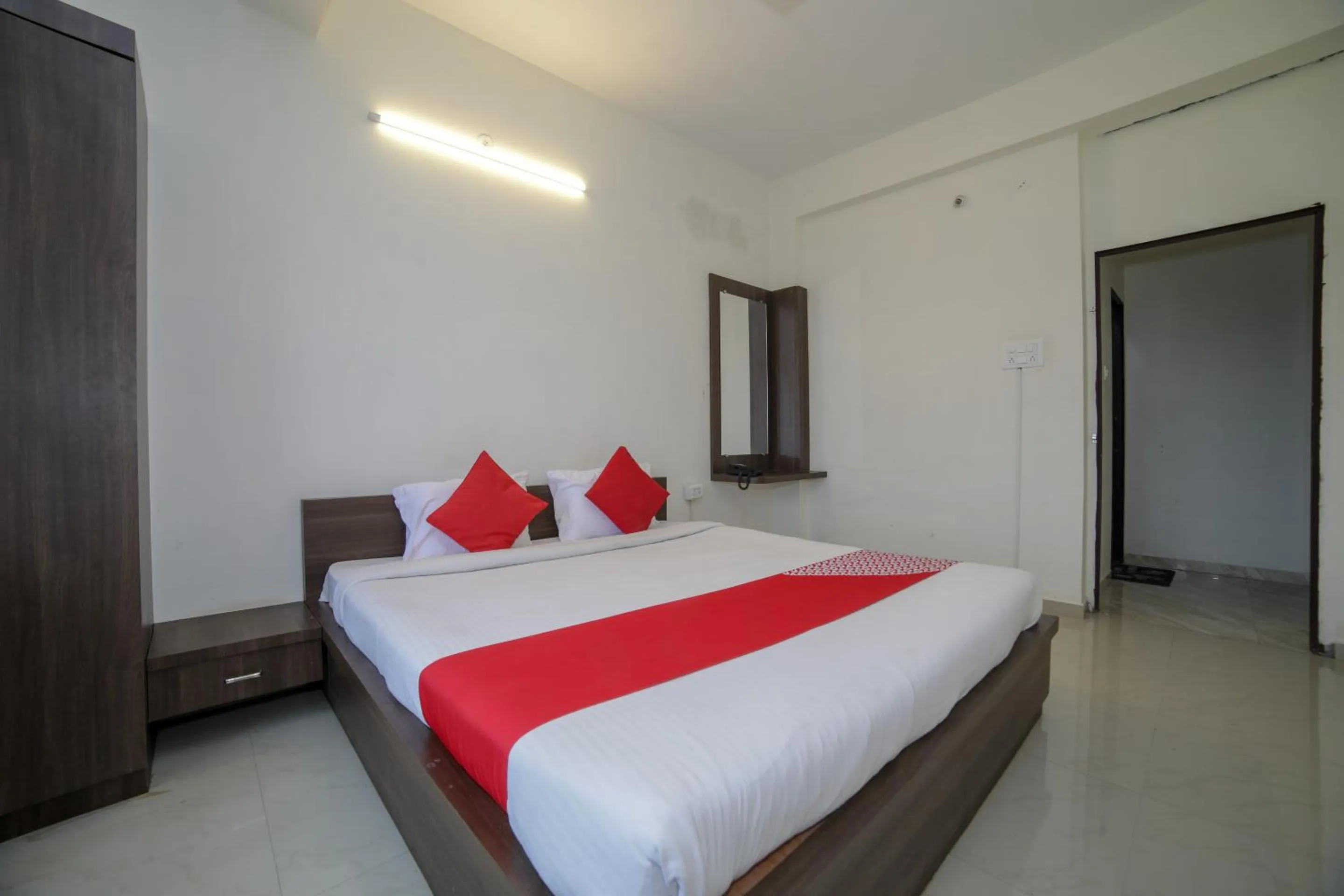 Bed in Hotel O Seva Service Apartment