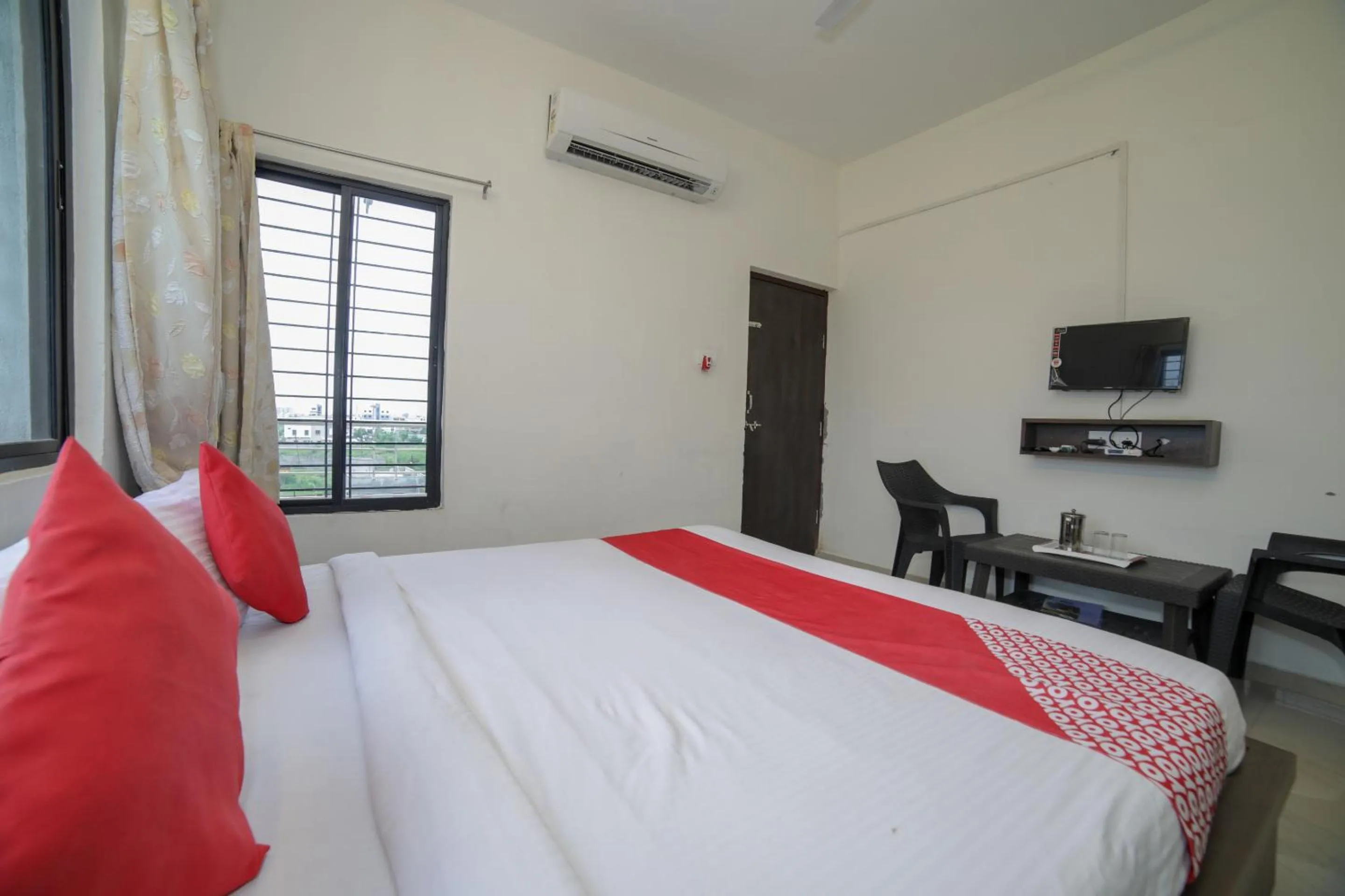 Bed in Hotel O Seva Service Apartment