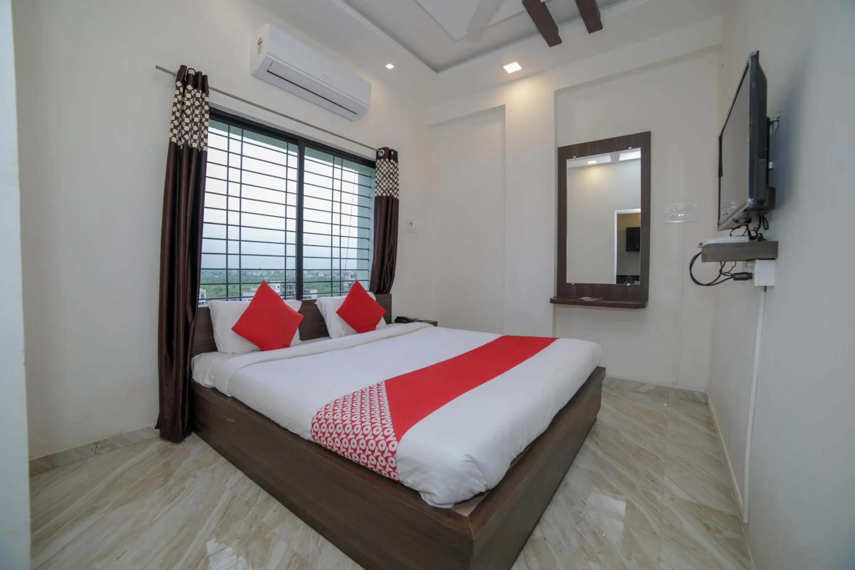 Bed in Hotel O Seva Service Apartment