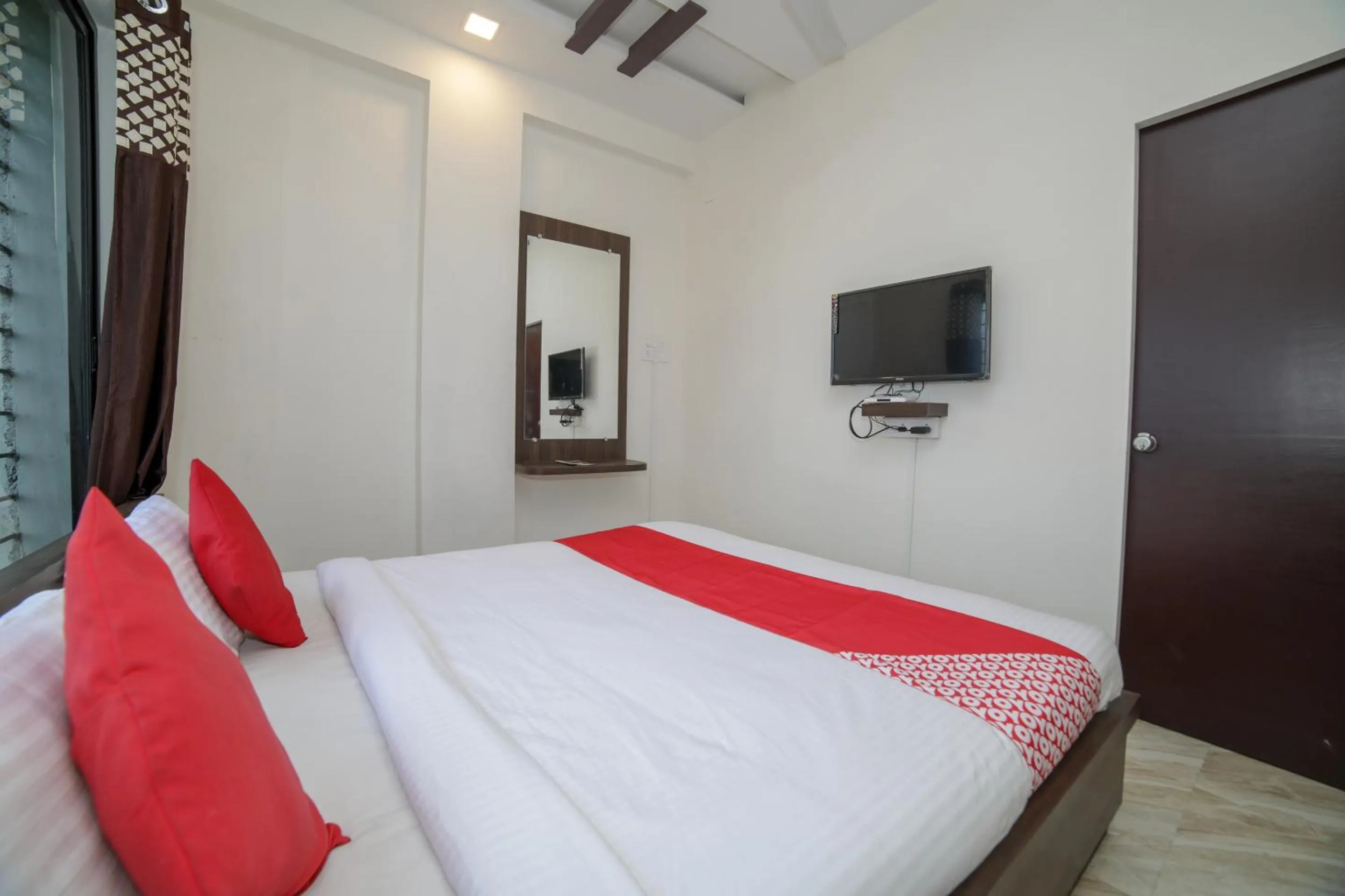 Bed in Hotel O Seva Service Apartment