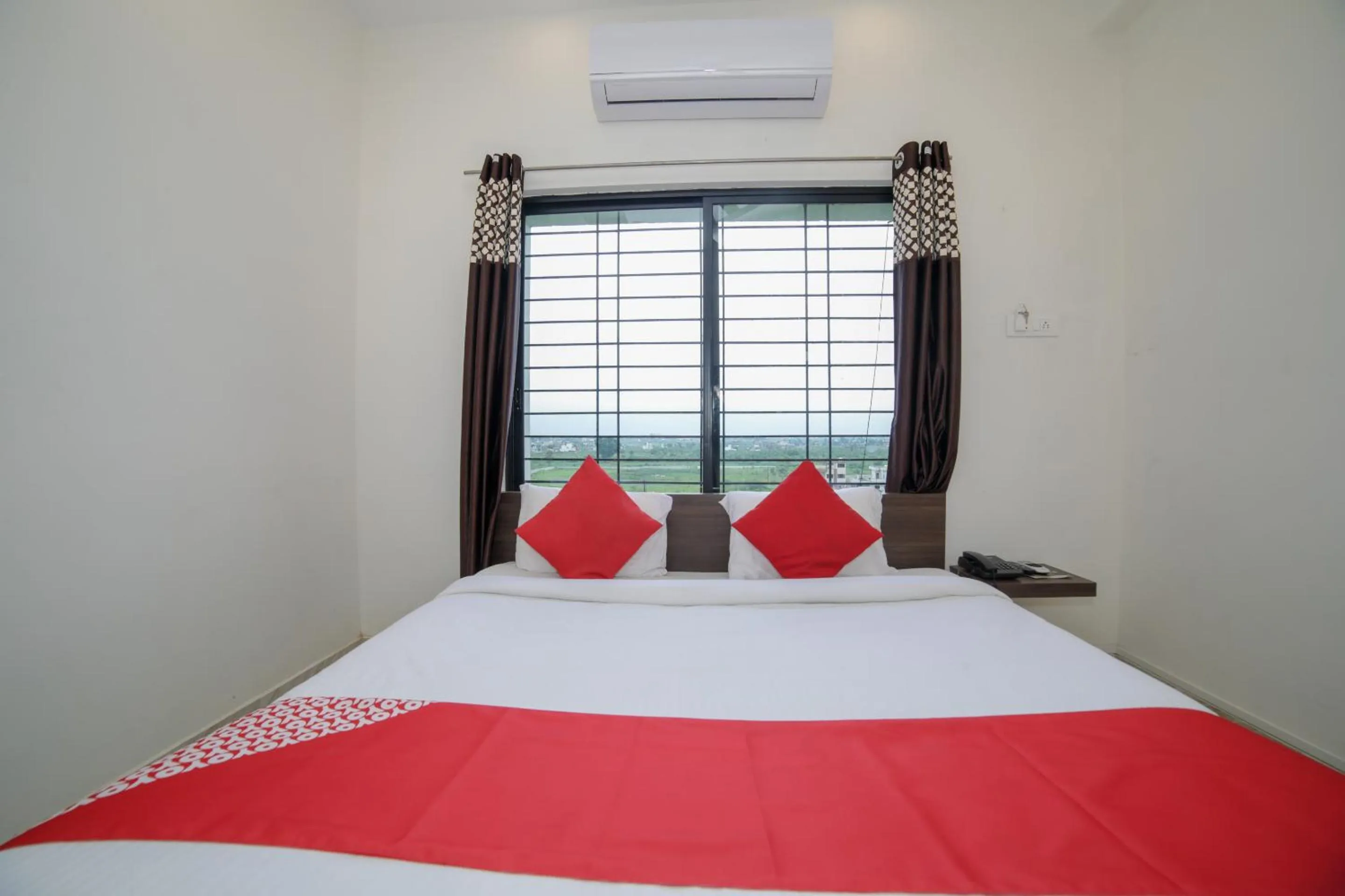 Bed in Hotel O Seva Service Apartment