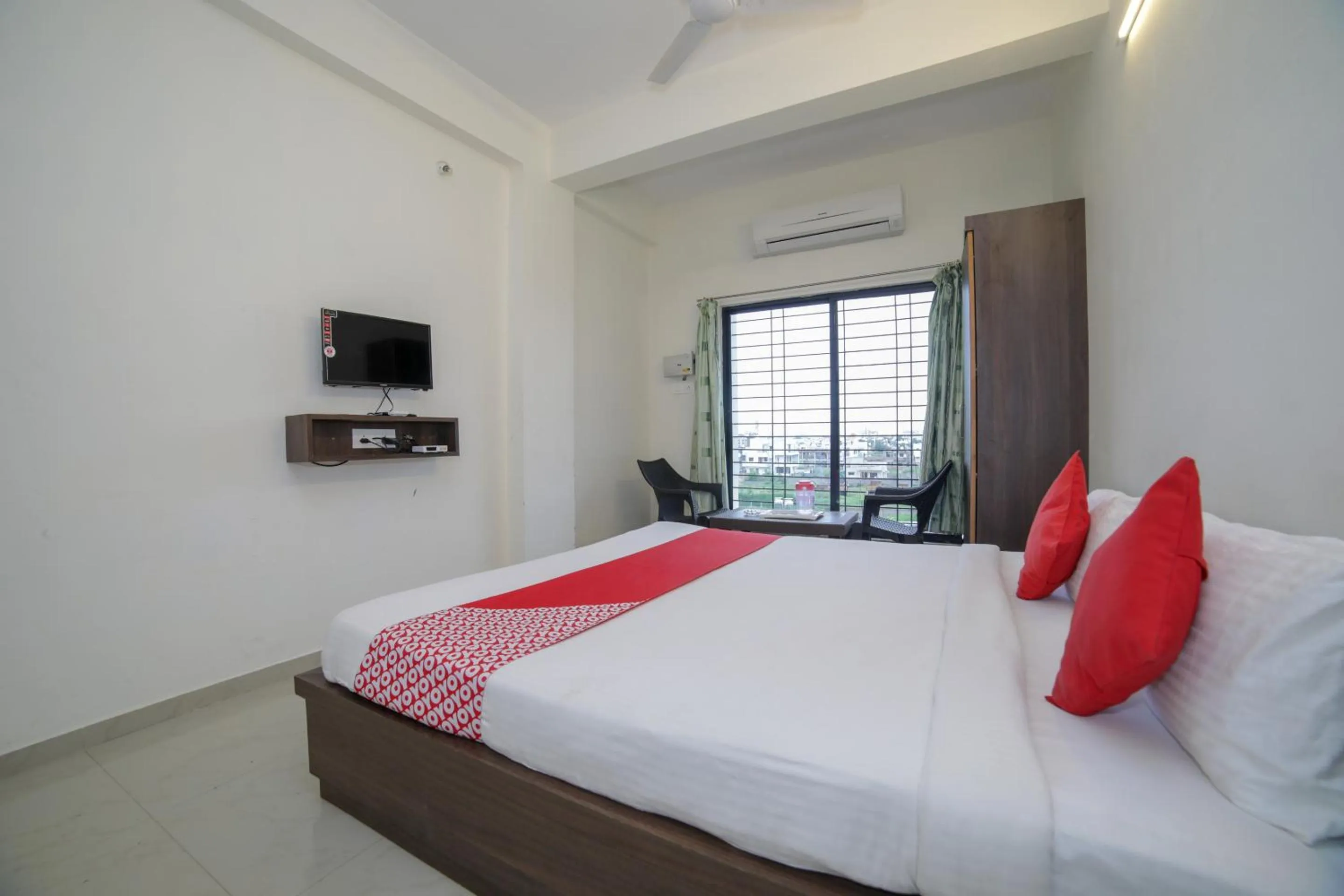 Bed in Hotel O Seva Service Apartment
