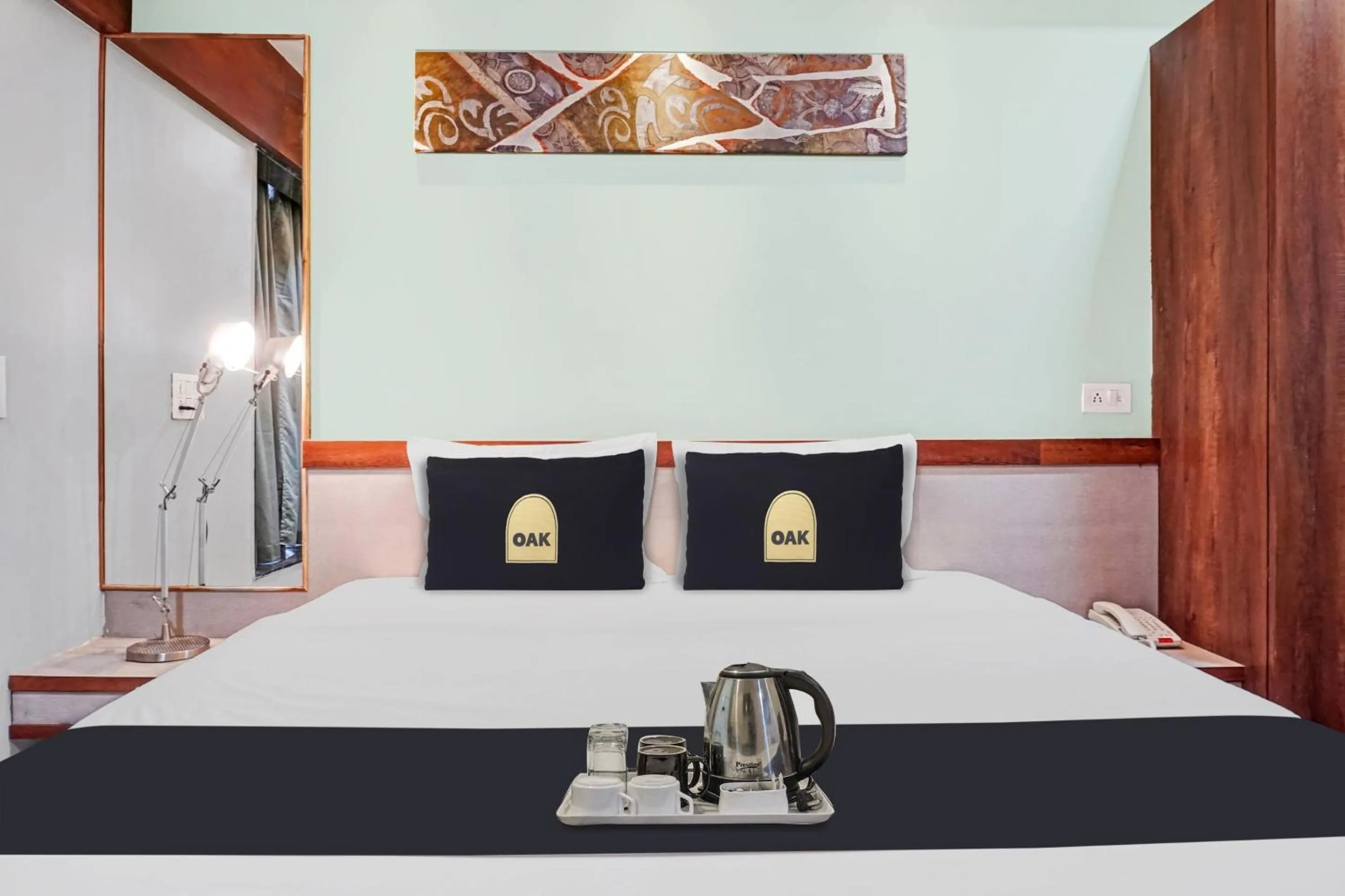 Bed in Super Townhouse OAK Hotel Rajmudra