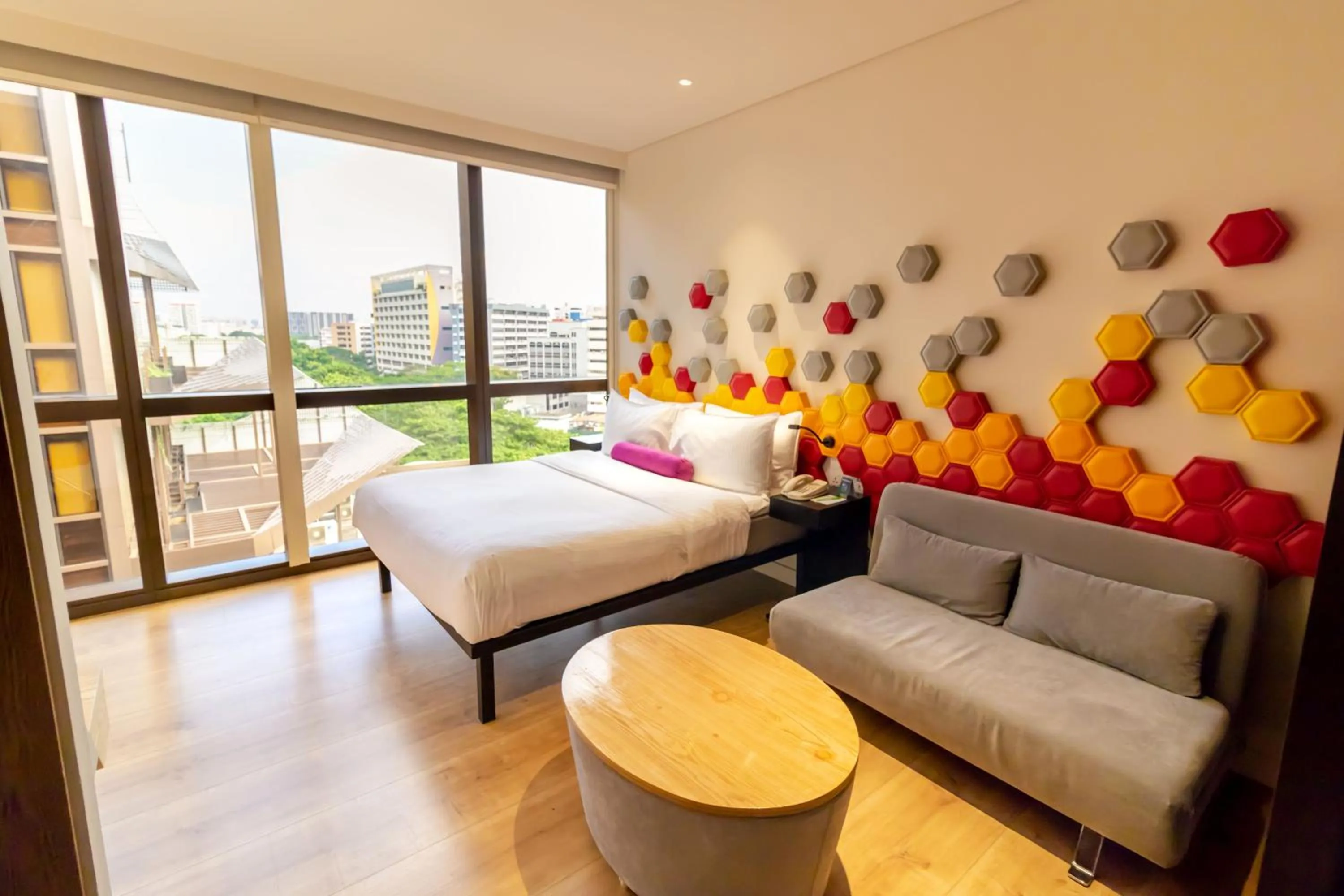 Seating area, Bed in Ibis Styles Singapore On Macpherson