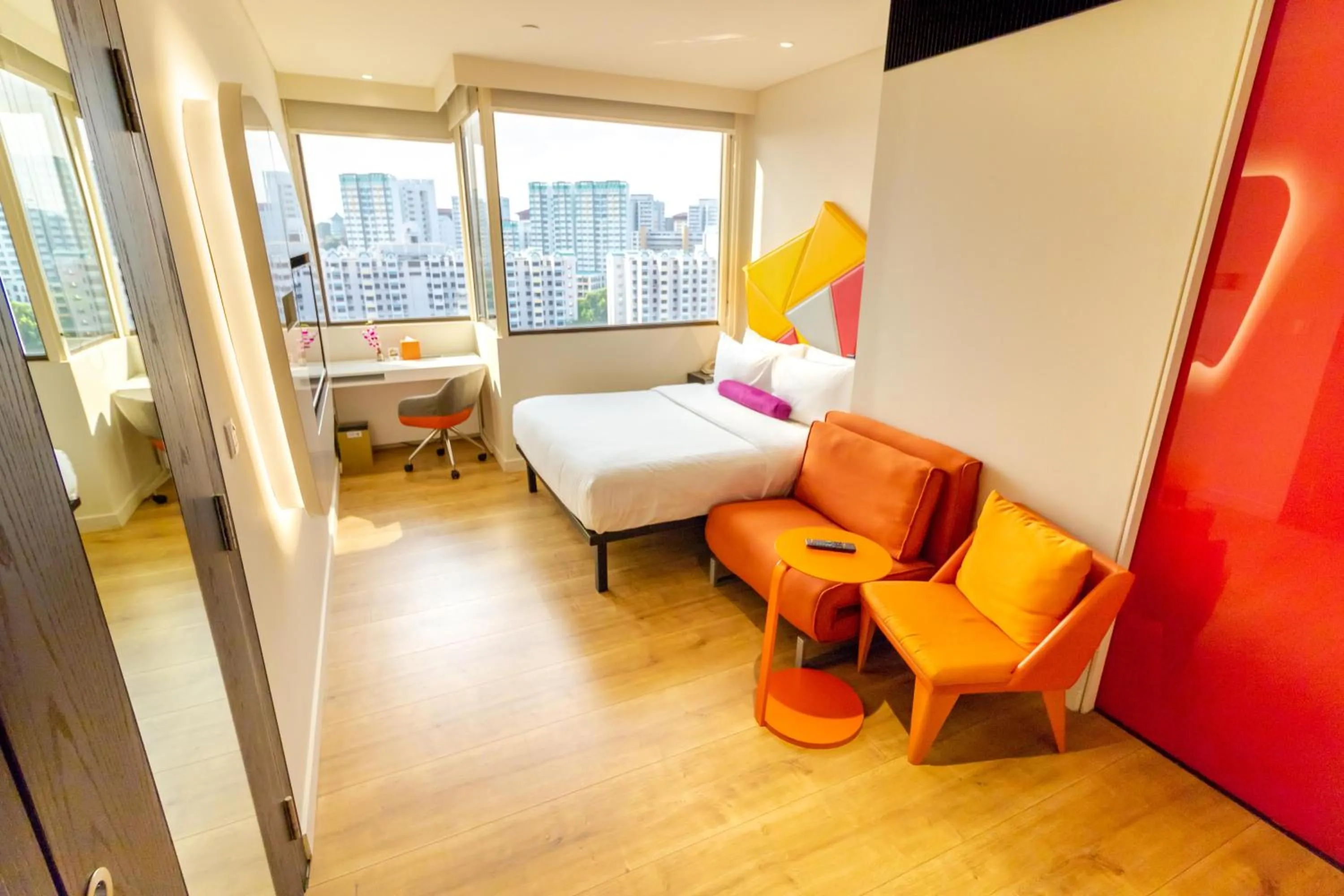Seating area, Bed in Ibis Styles Singapore On Macpherson