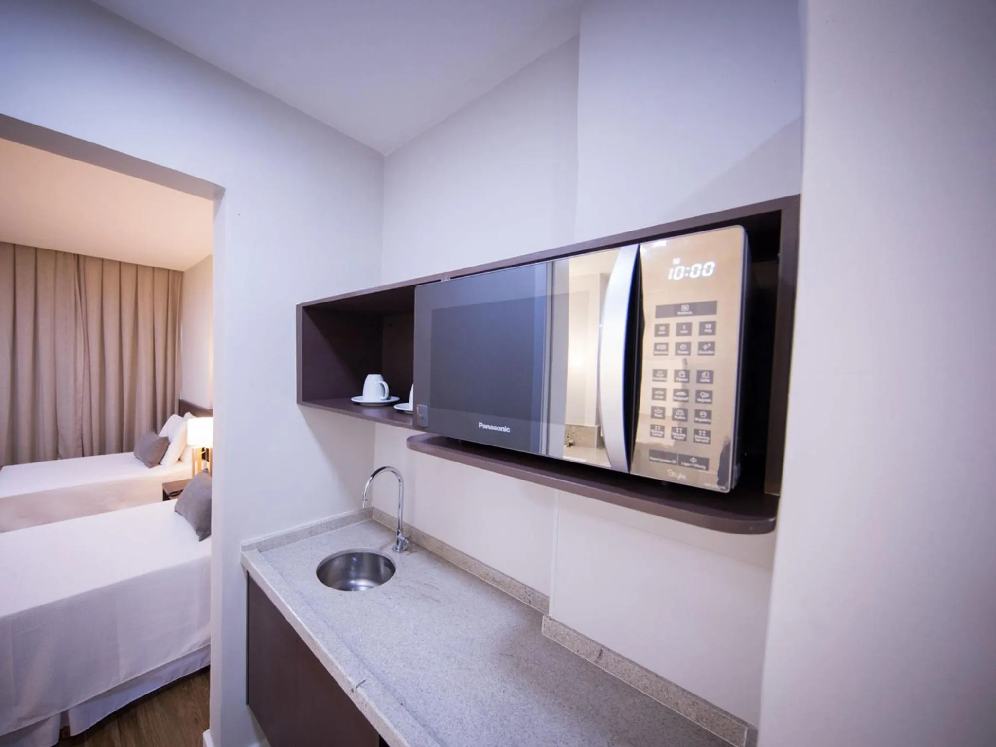 Bed in Vila Business Hotel