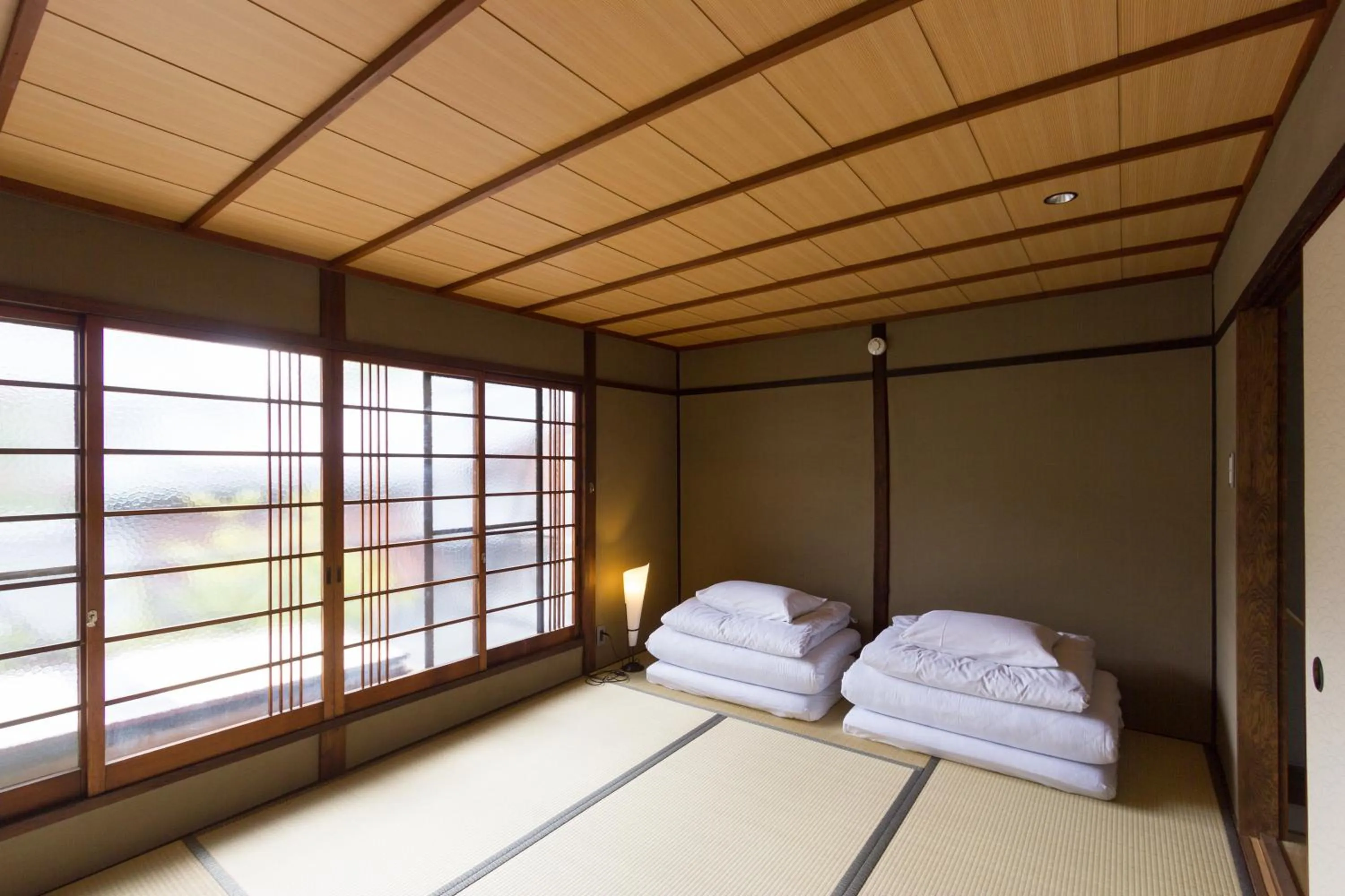 Bedroom, Bed in Tsukikusa an Machiya House