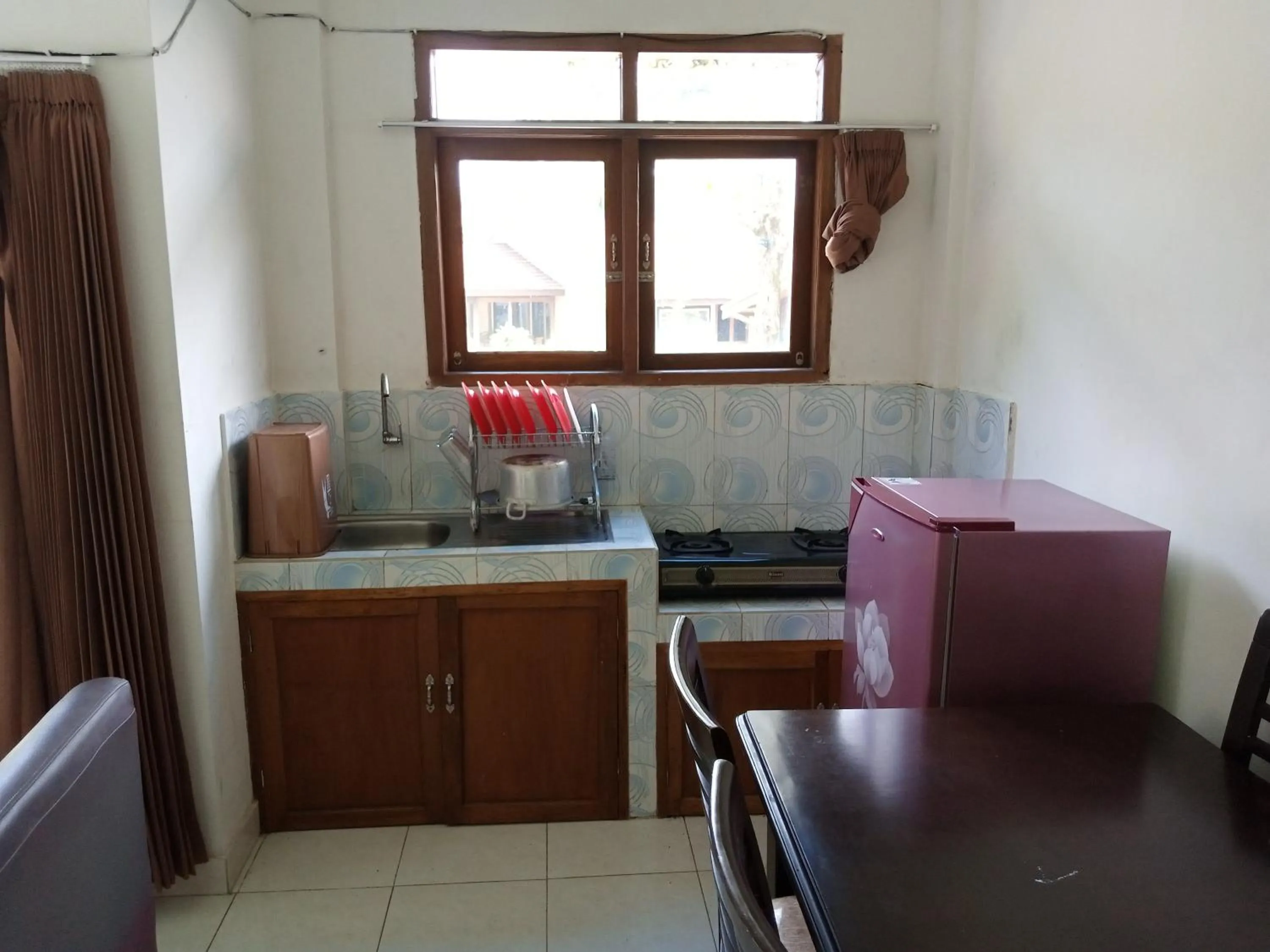 Kitchen or kitchenette in Villa Tjokro