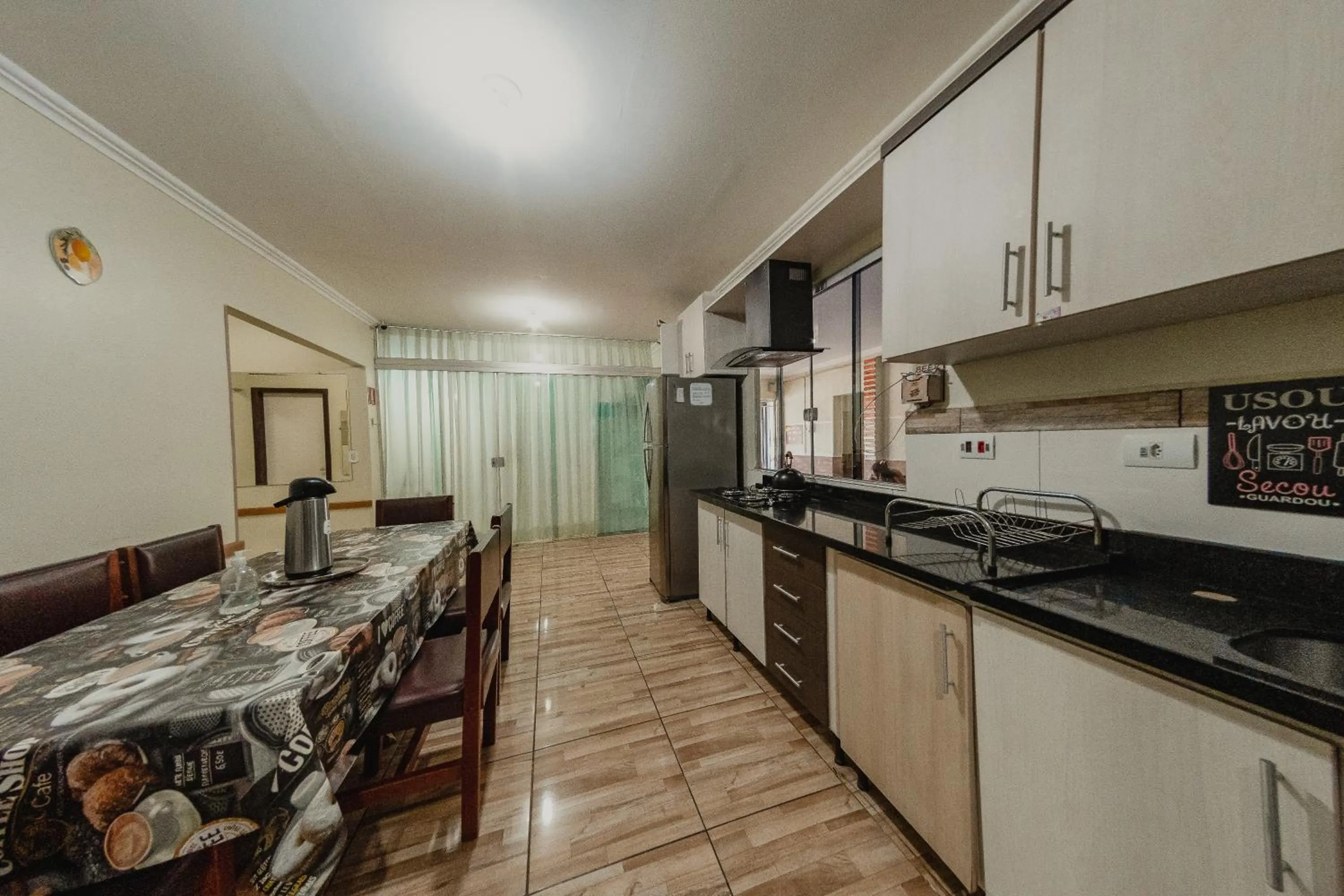 Kitchen or kitchenette in Pousada Iguassu Charm Suites