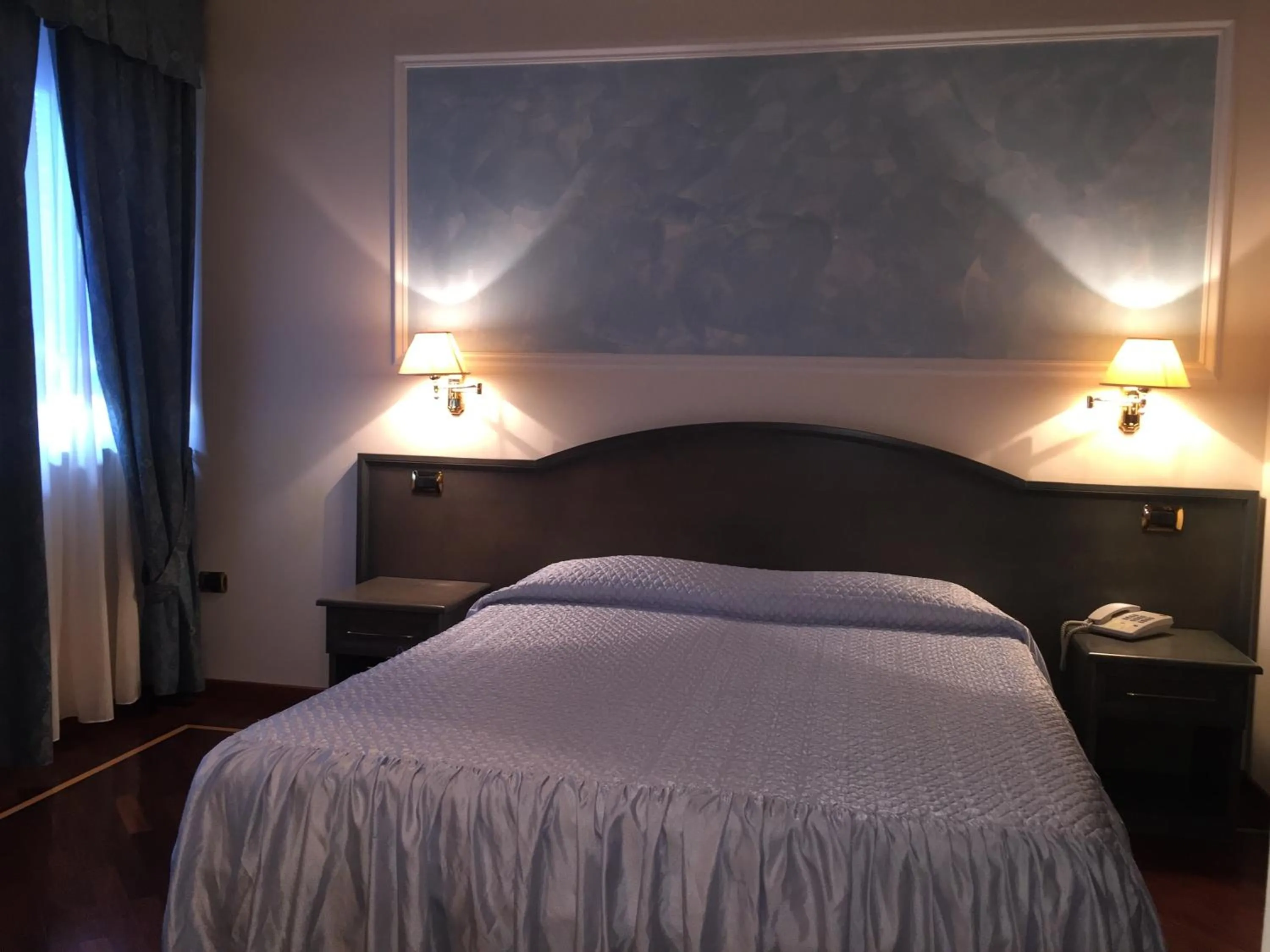 Photo of the whole room, Bed in Oscar e Amorina