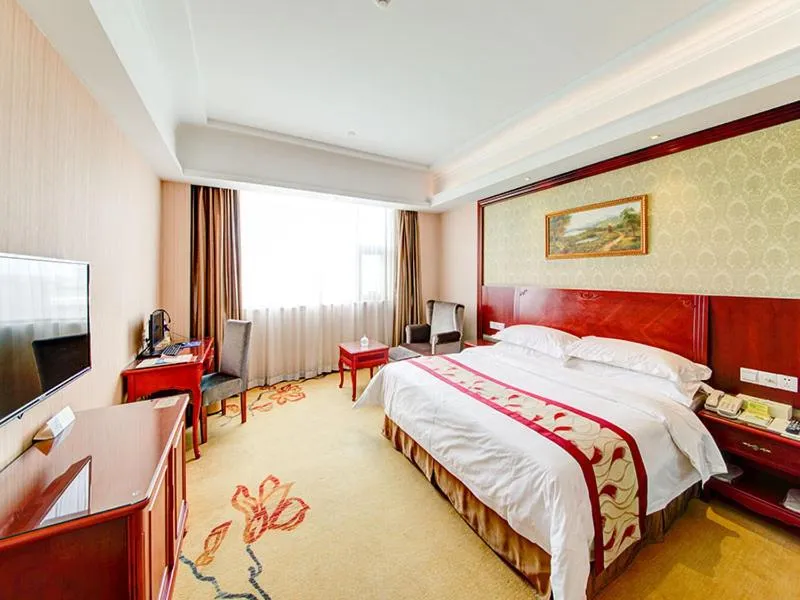 Bed in Vienna Hotel Shanghai Jiading New City