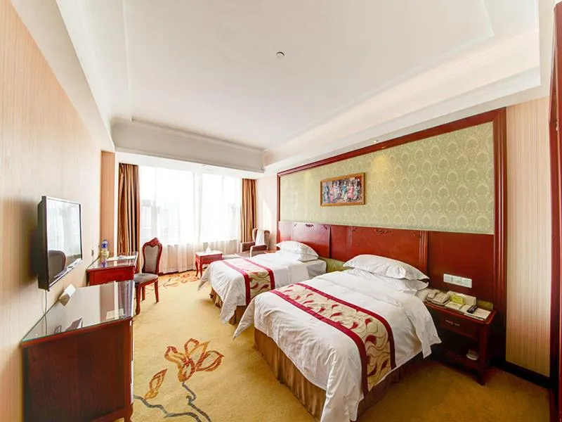 Bed in Vienna Hotel Shanghai Jiading New City