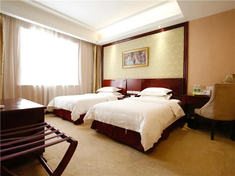 Bed in Vienna Hotel Suzhou Luokou Furniture Store