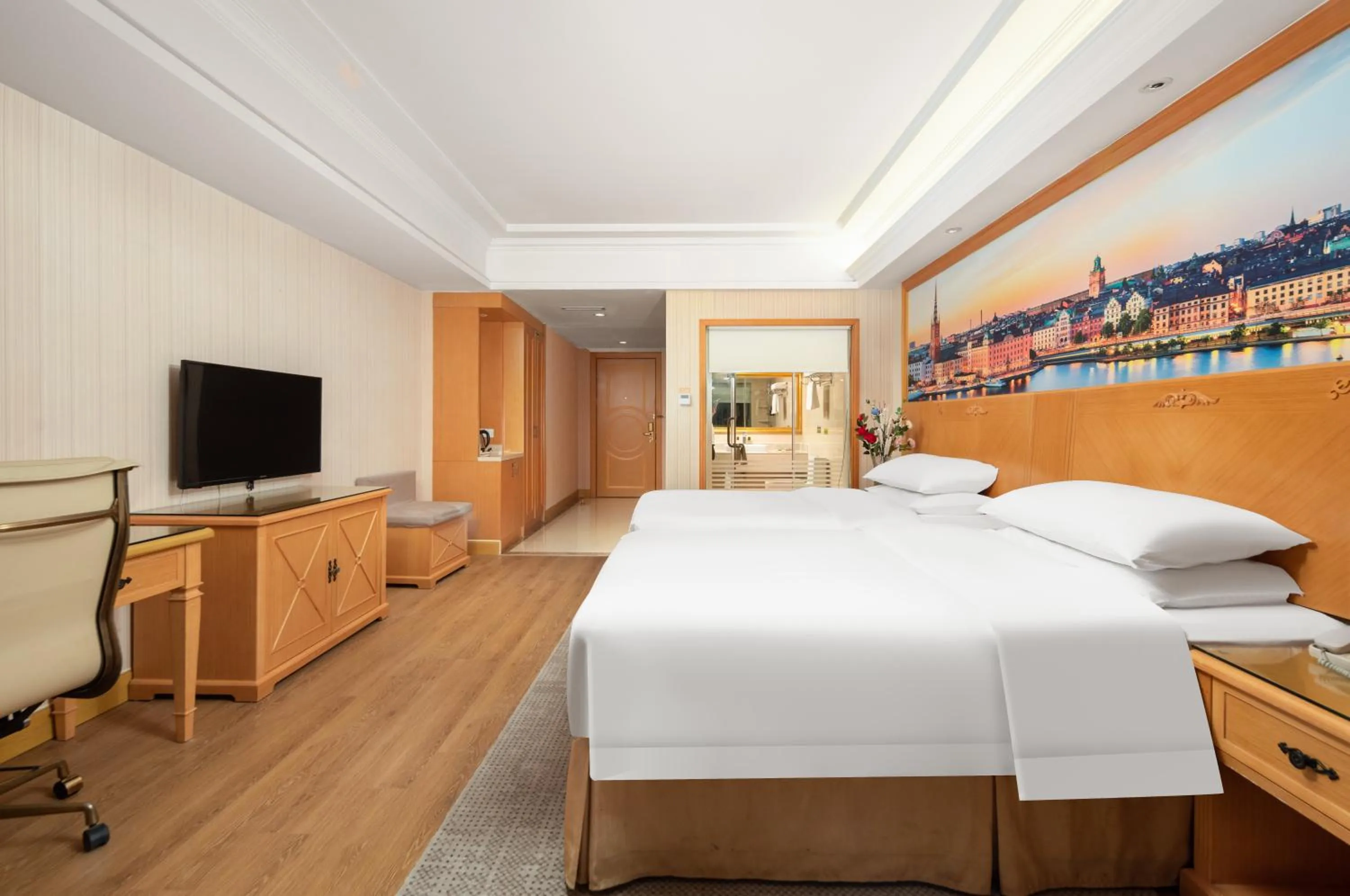 Bed in Vienna International Hotel Wuhan Jiefang Avenue