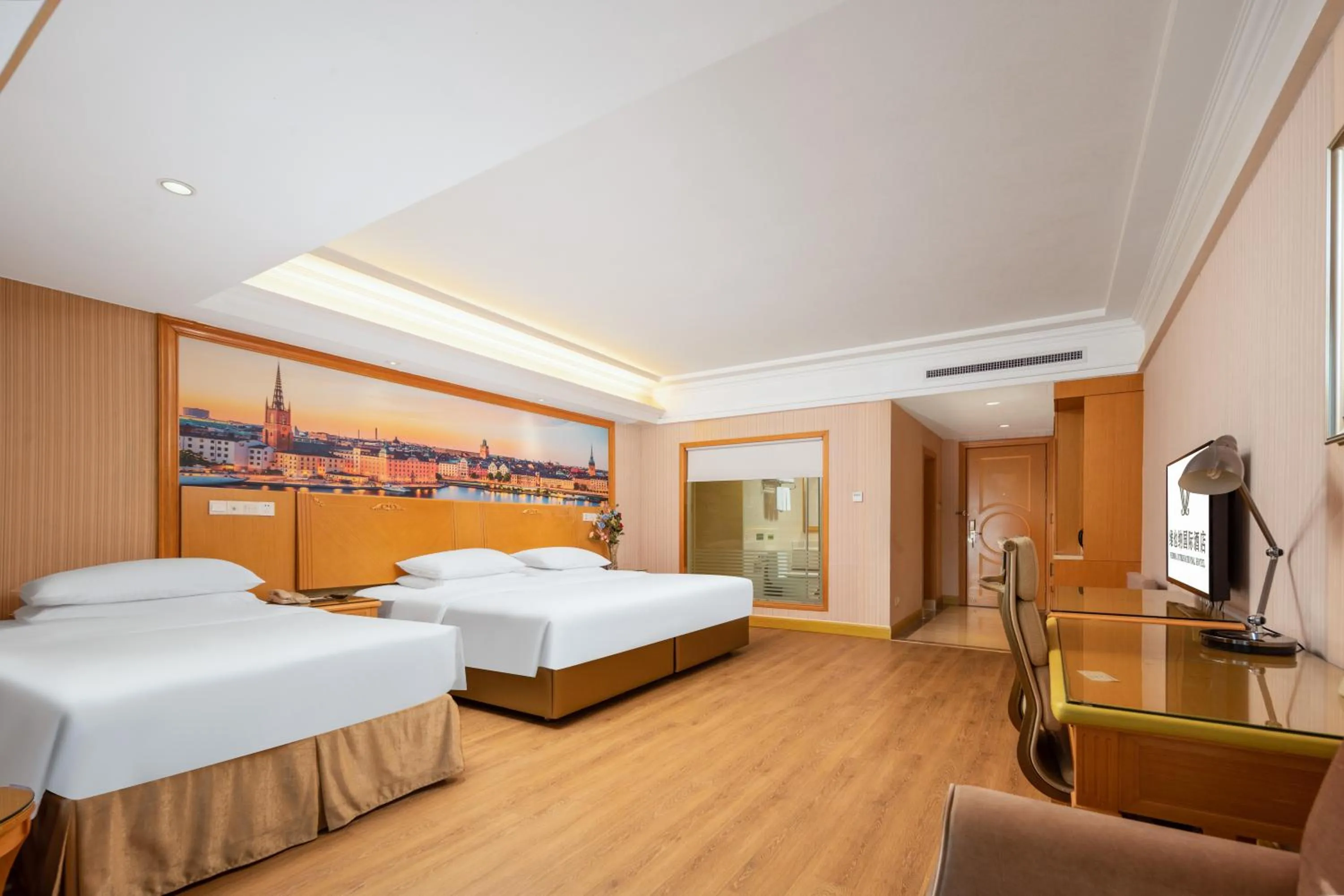 Bed in Vienna International Hotel Wuhan Jiefang Avenue