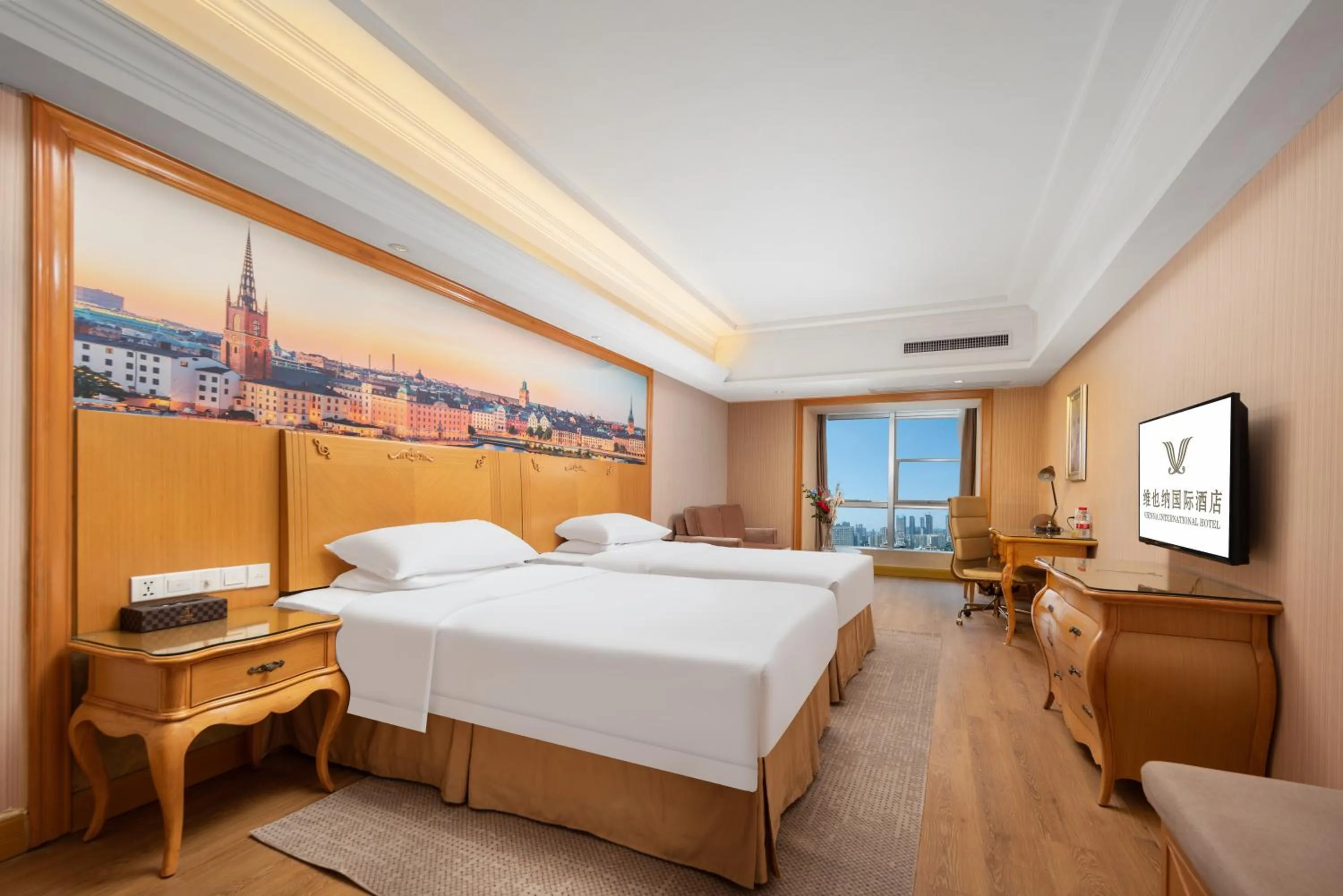 Bed in Vienna International Hotel Wuhan Jiefang Avenue