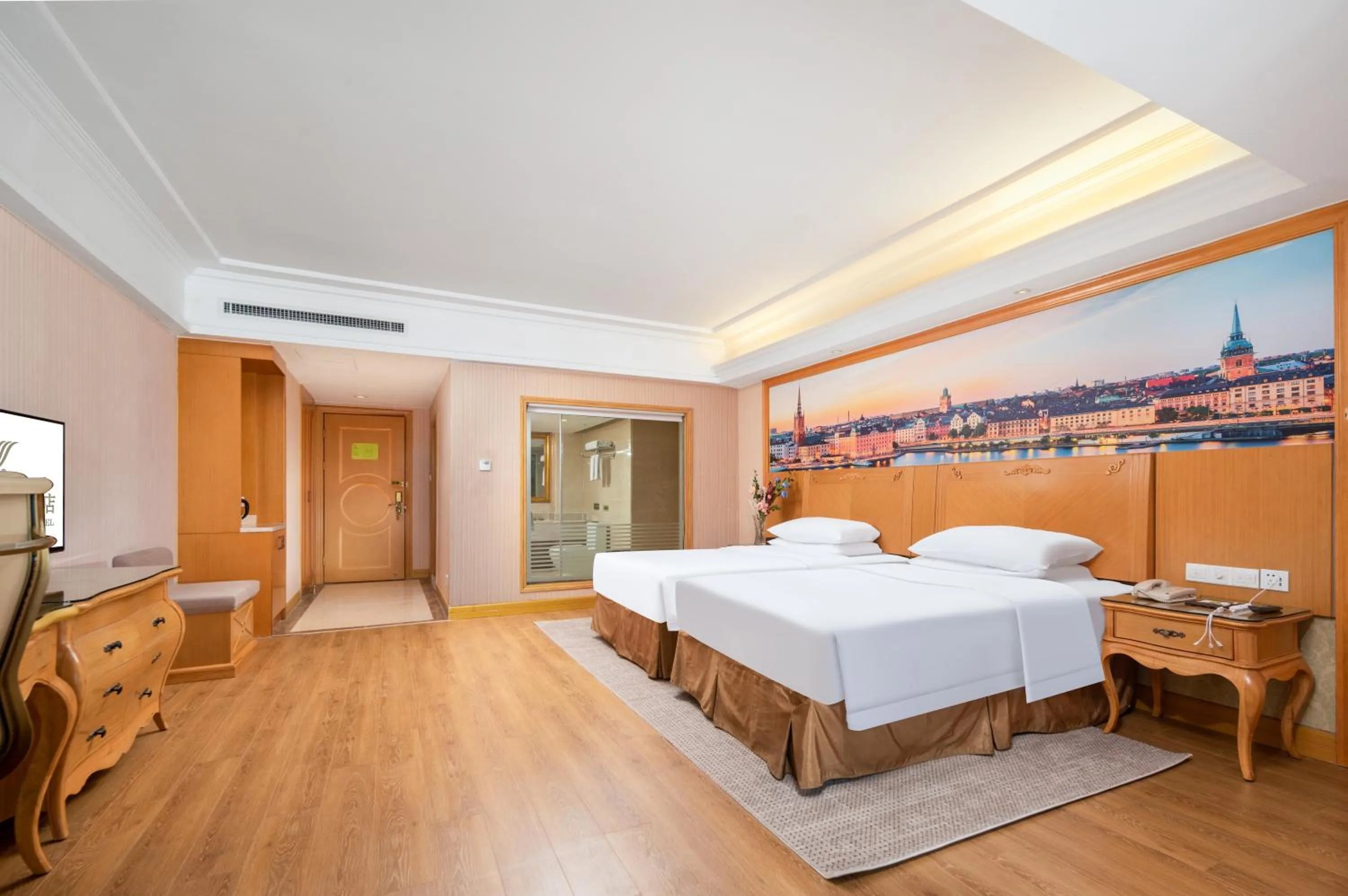 Bed in Vienna International Hotel Wuhan Jiefang Avenue