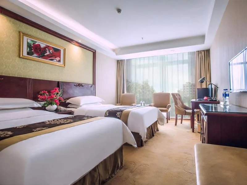 Bed in Vienna International Hotel Huizhou South Railway Station