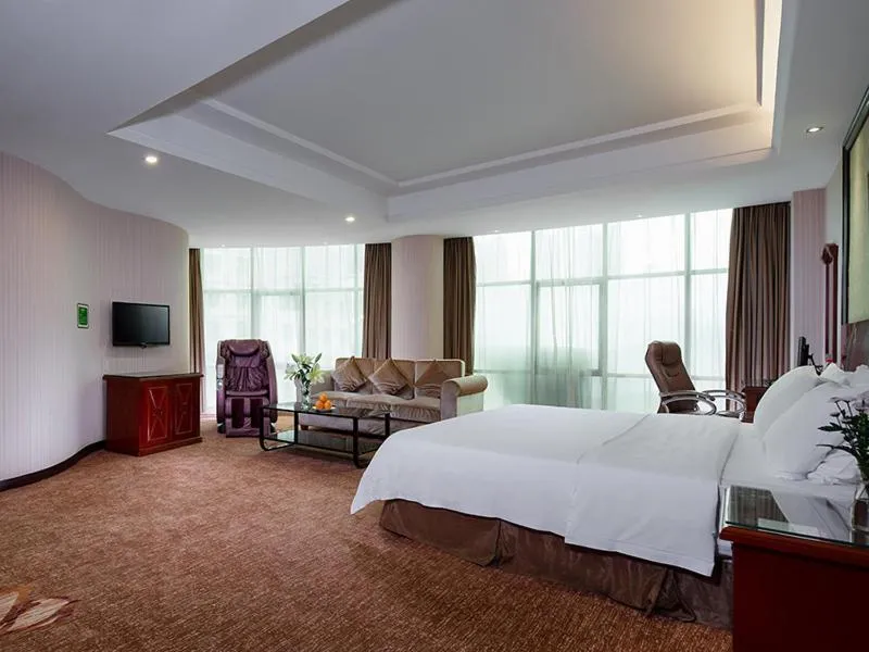 Bed in Vienna Hotel Huizhou Zhongxin