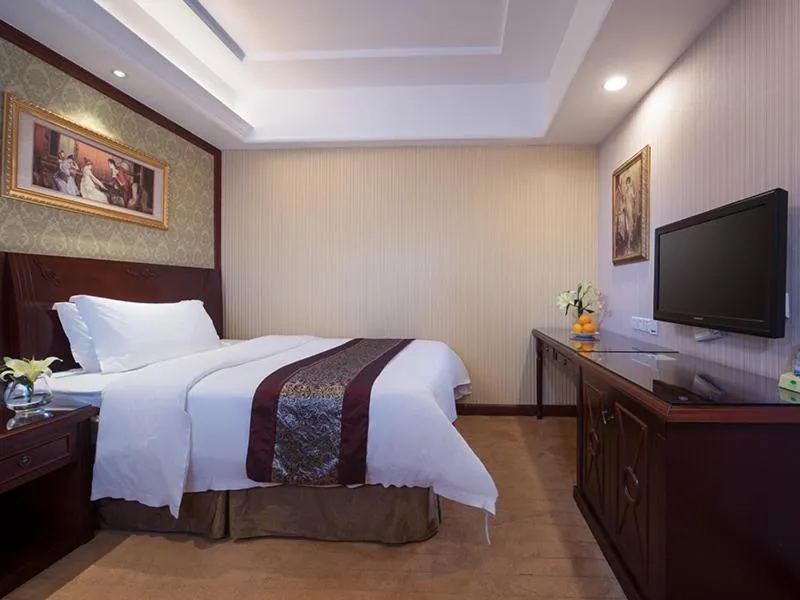 Bed in Vienna Hotel Shanwei Haifeng