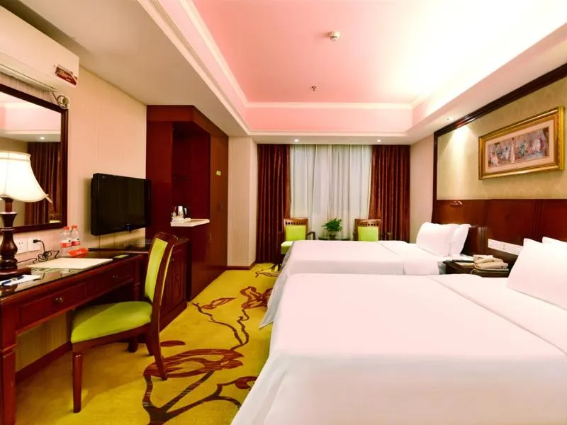 Bed in Vienna Hotel Shenzhen Railway station