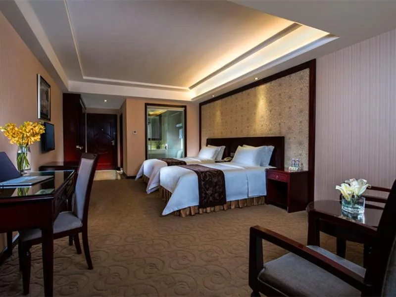 Bed in Vienna Hotel Shenzhen Fenghuang Road