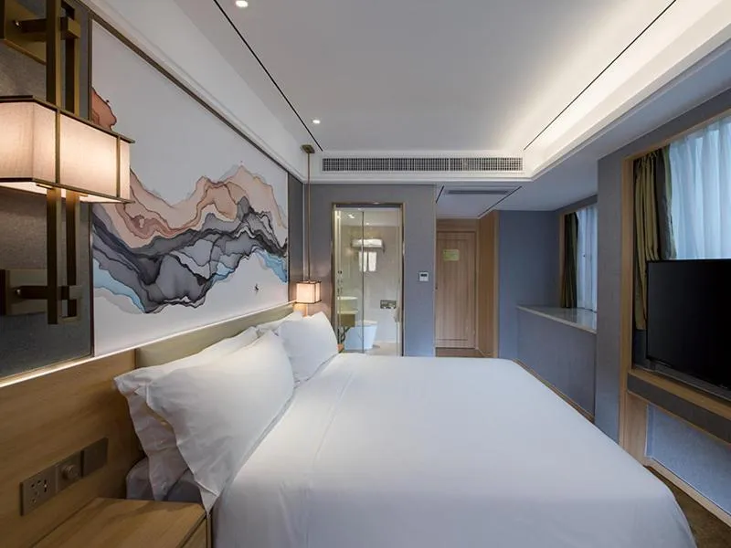 Bed in Vienna Hotel Shenzhen Exibition Center