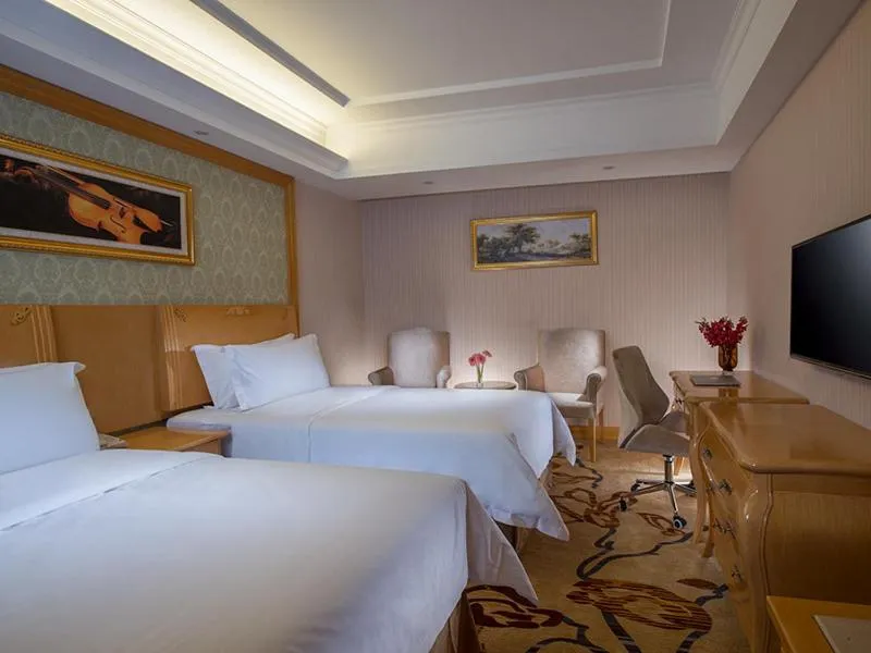 Bed in Vienna Hotel Shenzhen Nanshan Yilida