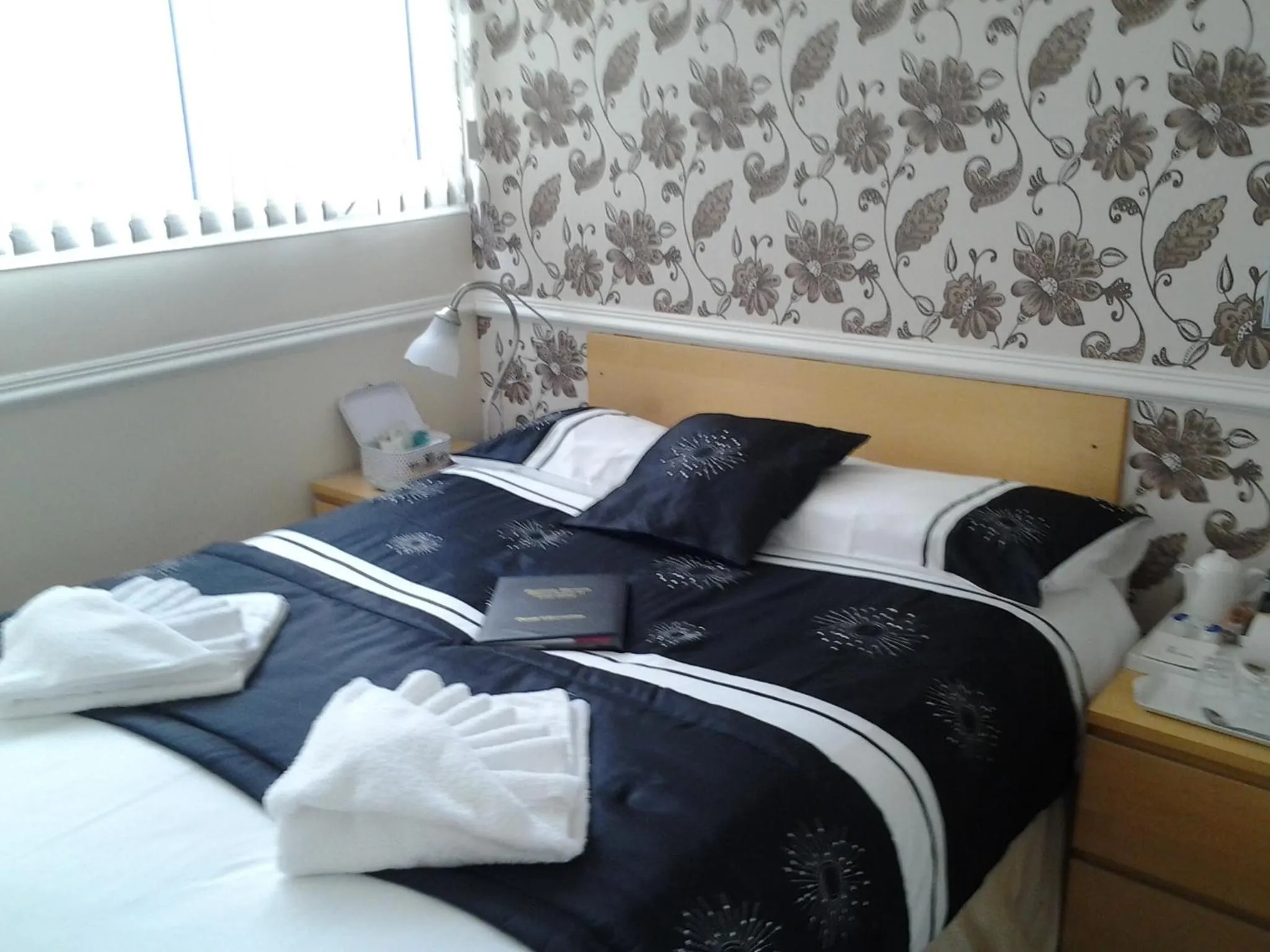 Bed in Surrey House Hotel