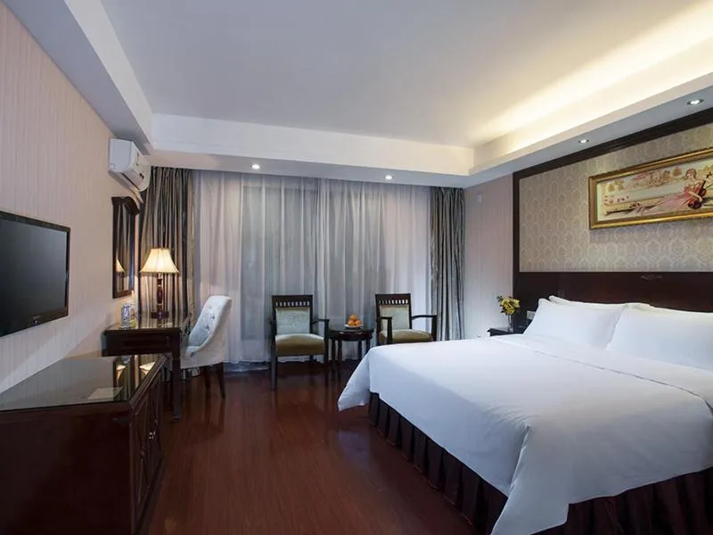 Bed in Vienna Hotel Shenzhen Shangjin Center