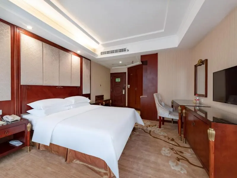 Bed in Vienna Hotel Shenzhen Songgang Shajiang Road