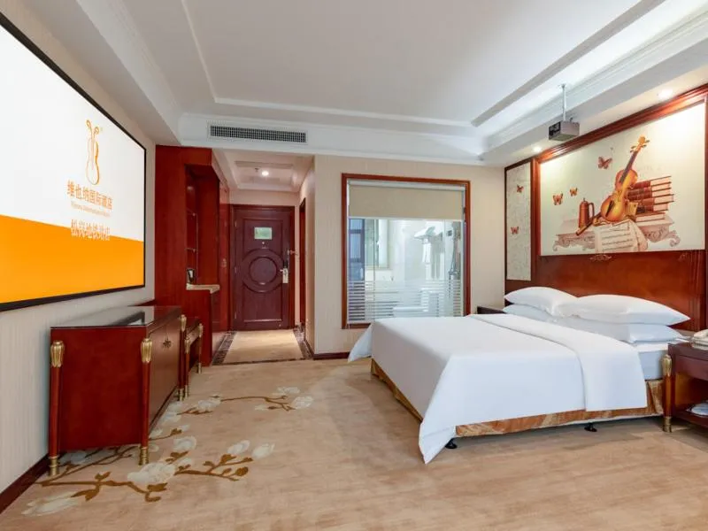 Bed in Vienna Hotel Shenzhen Songgang Shajiang Road