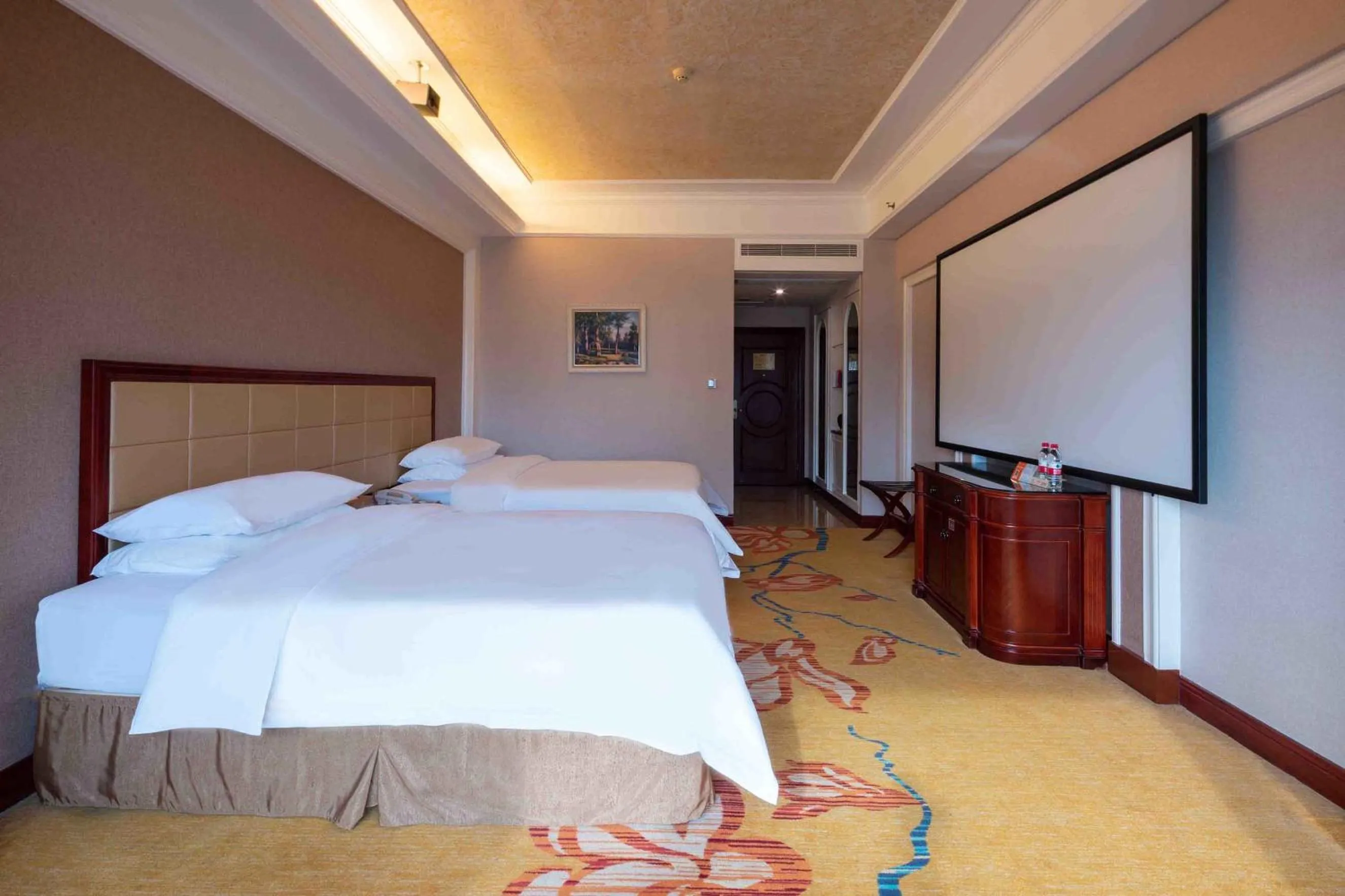 Bed in Vienna Hotel Shenzhen Songgang Liye Road